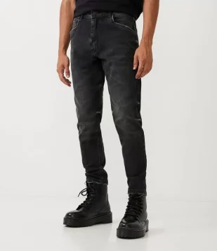 Calça Relaxed Jeans Com Bolsos E Pesponto Preto