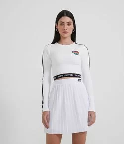 Blusa Cropped Manga Longa com Bordado Coração Now United