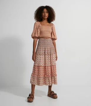 SAIA MIDI EM VISCOSE COM MIX DE ESTAMPAS FLORAIS E BABADOS LARANJA