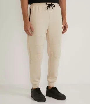 CALÇA JOGGER EM MOLETOM COM ESTAMPA TEXTURIZADA BEGE