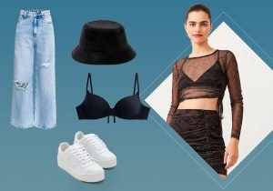 Imagem com fundo azul com uma mukher usando um top pretro, uma blusa cropped de manga comprida de tule ao lete um chapéu preto, um sutiã preto e um tenis branco