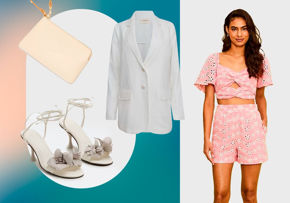 Imagem com fundo branco e azul e uma mulher usando usando uma blusa cropped rosa com estampa branca e um short cintura alta rosa com estampa branca e ao lado um blazer branca, uma bolsa de mão bege e uma saldalia de salto prata com flores