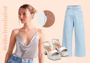 Imagem com fundo bege com uma mulher branca de cabelo preso em coque com uma blusa de alça com brilho ao lado direito tem uma sandalia branca e uma cala wide leg jeans claro