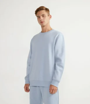 BLUSÃO EM MOLETOM COM RIBANA E BARRA AJUSTADA AZUL