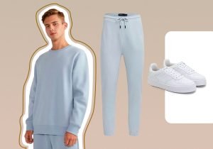 Imagem com fundo bege claro com um homem usando uma blusa de frio azul claro, e ao lado tem uma calça jogger de moletom azul claro e um sapato branco.