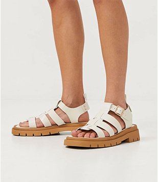 Sandália Rasteira Com Tiras Largas E Sola Tratorada Off White