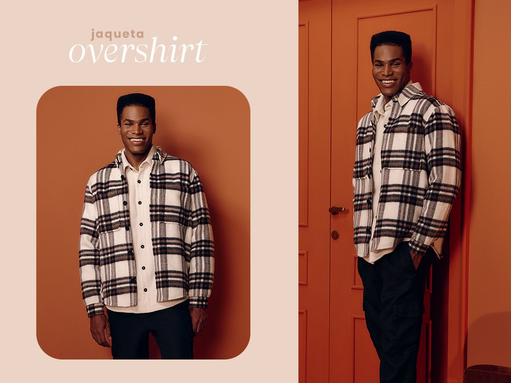 Homem vestindo uma jaqueta xadrez, uma camisa de manga comprida branca e uma calça preta