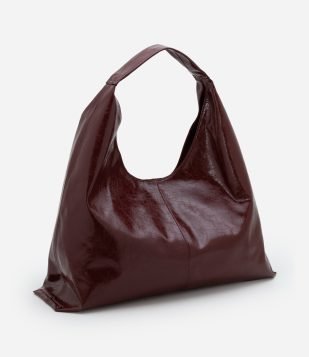 Bolsa Hobo Grande Texturizada com Detalhe de Costura Central Vinho