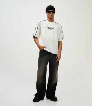 Calça Jeans Masculina Baggy Flare Preta com Barra Desfeita Preto