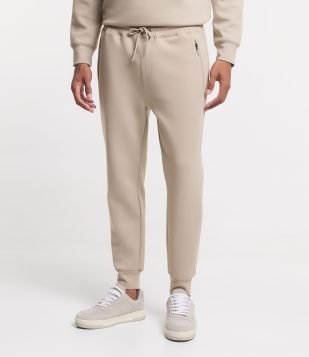 Calça Jogger Esportiva com Zíper no Bolso e Barra Ajustada Bege