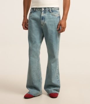 Calça Flare em Jeans com Lavagem Dirty Azul