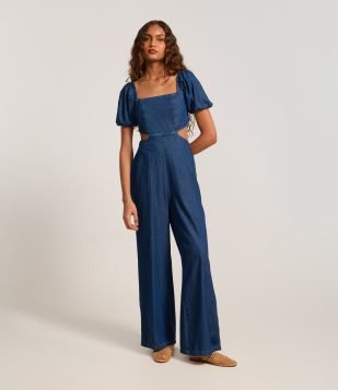 Macacão Jeans com Manga Bufante e Vazado na Cintura Escuro