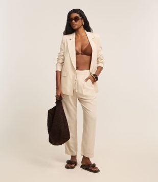 Calça Fluída em Viscolinho com Cós Elástico e Amarração Bege Crú