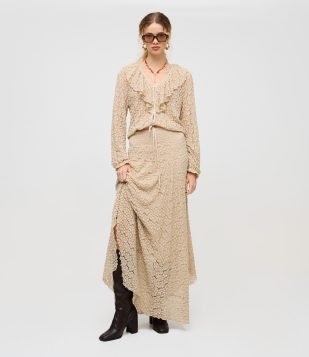 Saia Midi em Renda Texturizada com Barra Assimétrica Bege Claro